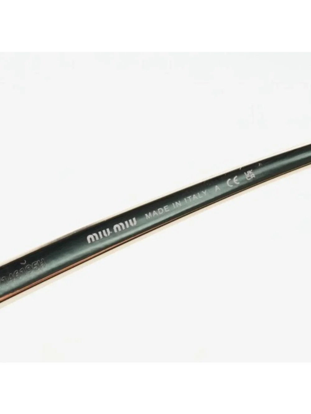 Miu Miu MUA56S 5AK90L Sunglasses Gold Geometric Frame, Brown Lenses